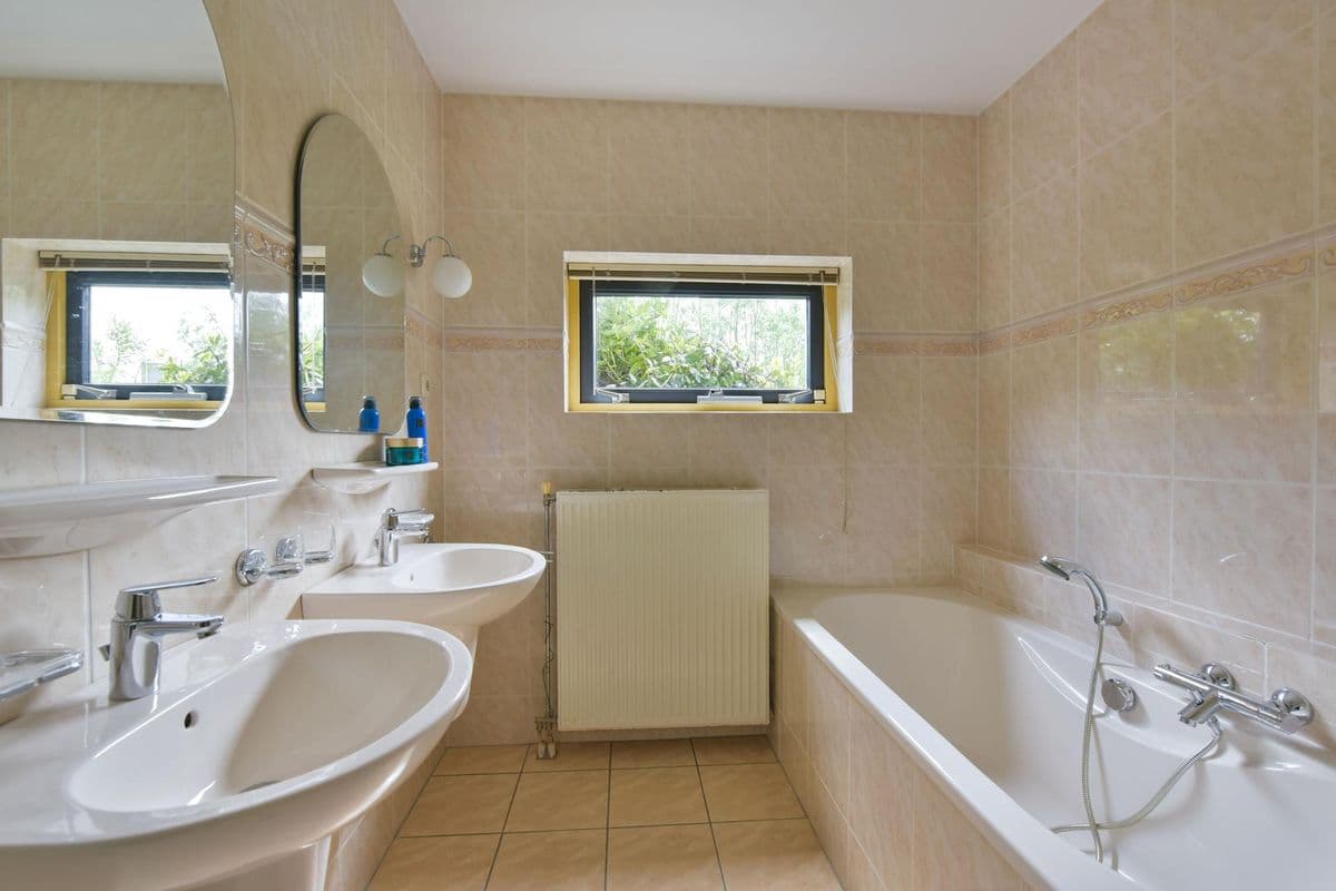 Screenshot van het upload-dashboard met foto's van een woning